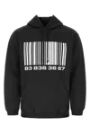 Vtmnts Contrasting Prints Oversized Hooded Sweatshirt In Black