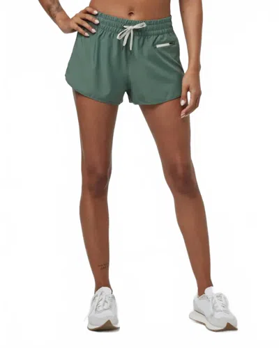 Vuori Clementine Mid Rise Short In Green Marsh