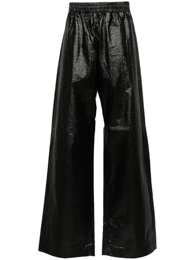Walter Van Beirendonck Embroidered-logo Trousers In Black