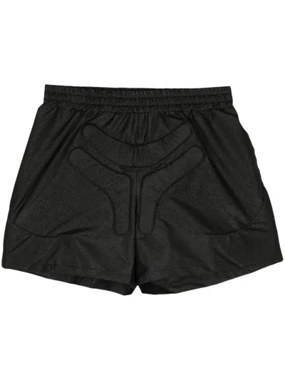 Walter Van Beirendonck Space Logo-embossed Track Shorts In Black