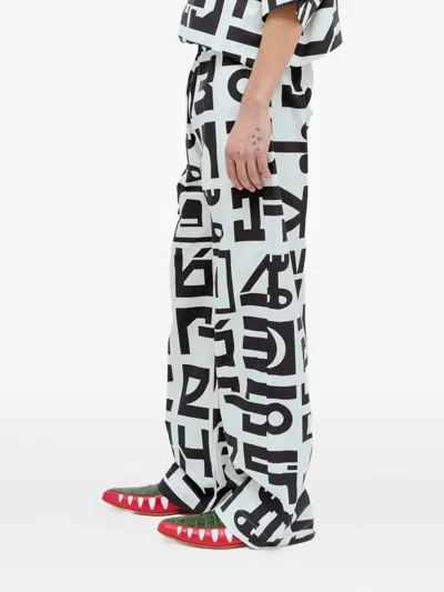 Walter Van Beirendonck Star Trousers In Black
