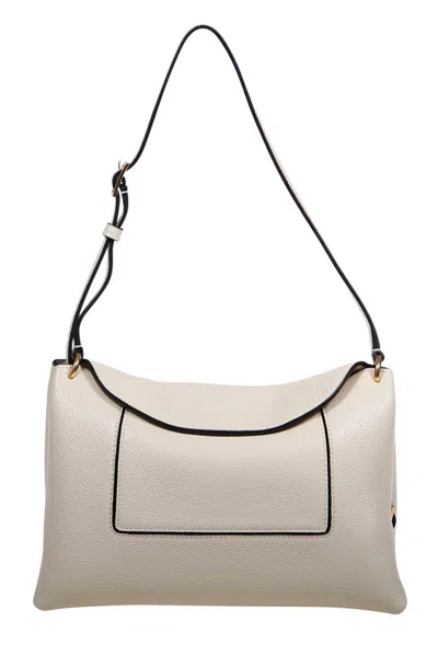Wandler Penelope Logo Printed Shoulder Bag In Sand