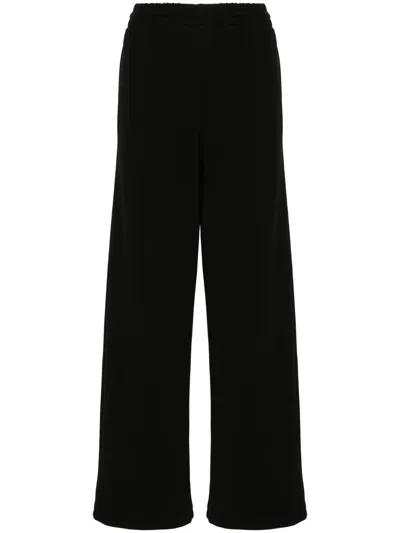 Wardrobe.nyc Ribbed Straight-leg Trousers In Black
