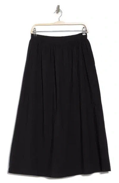 Wayf Elastic Back Cotton Maxi Skirt In Black