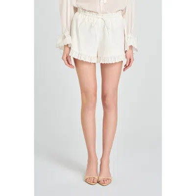 Wayf Helena Eyelet Ruffle Stretch Cotton Shorts In Ivory