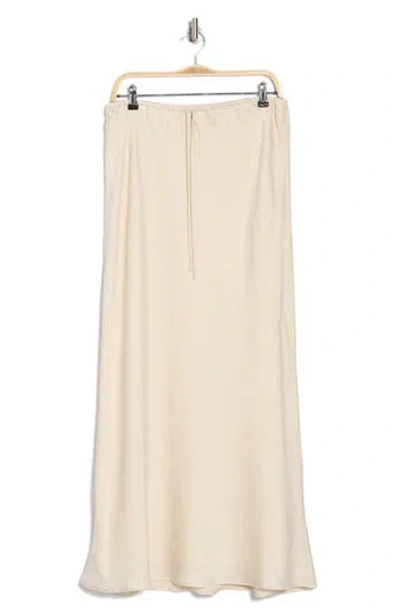 Wayf Satin Bias Maxi Skirt In Parchment