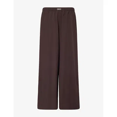 We Are Tala Omens  Wide-leg Silicone-branding Studio Trousers In Brown