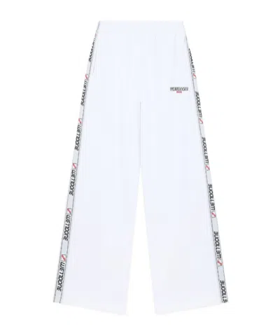 We11 Done 1506 Logo Tape Track Pants In White