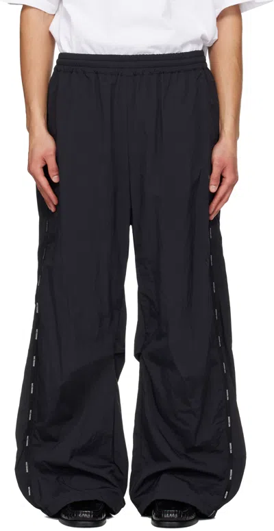We11 Done Black Logo Tape Track Pants