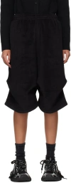 WE11 DONE BLACK TUCK SHORTS