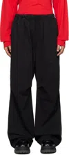 We11 Done Black Tucked Wide Trousers In Black