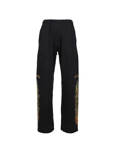 We11 Done Flame-graphic Track Pants In Black