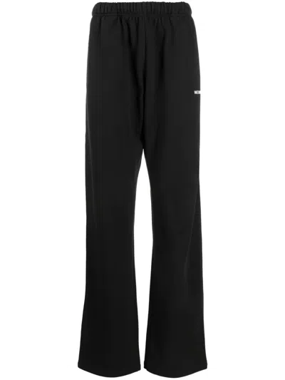 We11 Done Logo-print Track Pants In Black