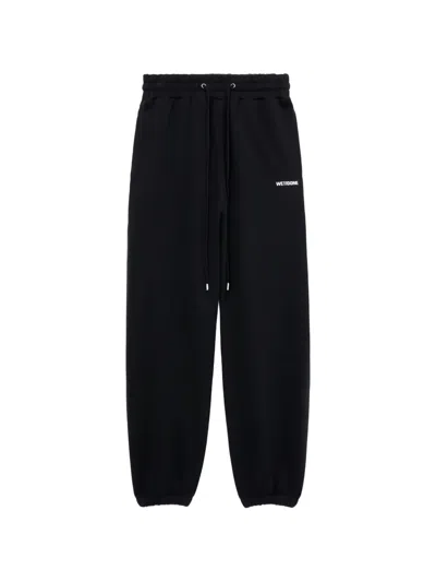 We11 Done Logo-detail Trousers In Black