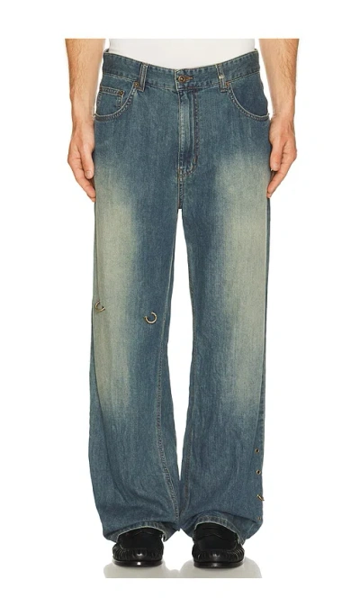 We11 Done Piercing Denim Jeans In Blue