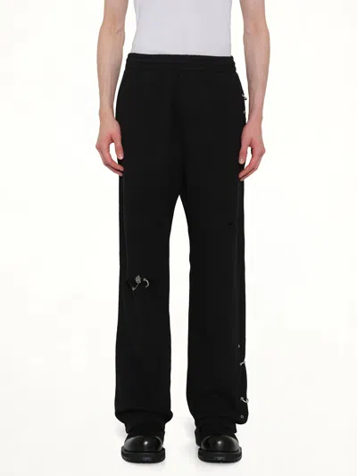 We11 Done Piercing Detail Sweatpants In Black