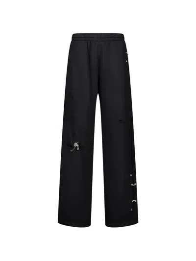 We11 Done Piercing-detail Track Pants In Black