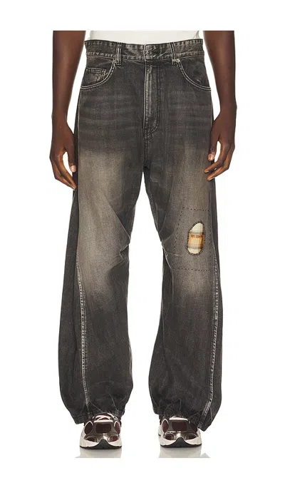 We11 Done Repaired Checkcurved Denim Jeans In Black