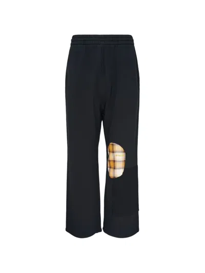 We11 Done Repaired-effect Track Pants In Black