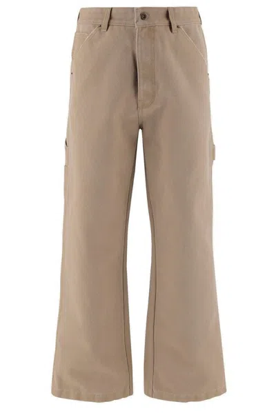 We11 Done We11done Logo Patch Pants In Brown