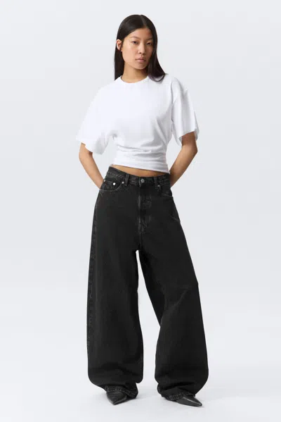 Weekday Astro Mid Rise Baggy Faux Leather Pocket Jeans In Black