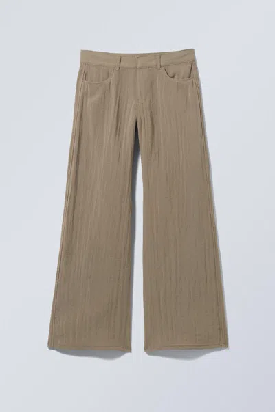 Weekday Crinkle Low Waist Loose Fit Trousers In Brown