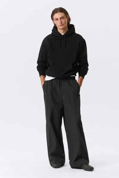 Weekday Mid Rise Loose Baggy Leg Nylon Trousers In Black