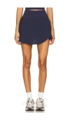 Wellbeing + Beingwell Movewell Harlow Pleated Skirt In Blue