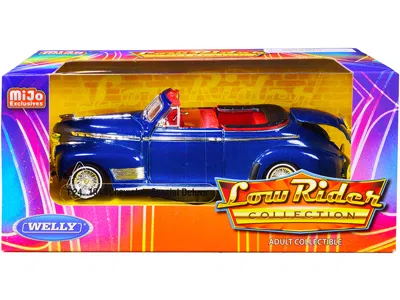 WELLY 1941 CHEVROLET SPECIAL DELUXE CONVERTIBLE CANDY BLUE METALLIC WITH RED INTERIOR "LOW RIDER COLLECTIO