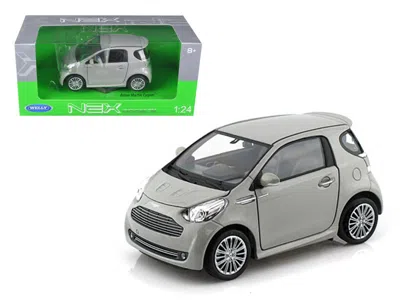 WELLY ASTON MARTIN CYGNET SILVER 1/24 DIECAST MODEL CAR BY WELLY