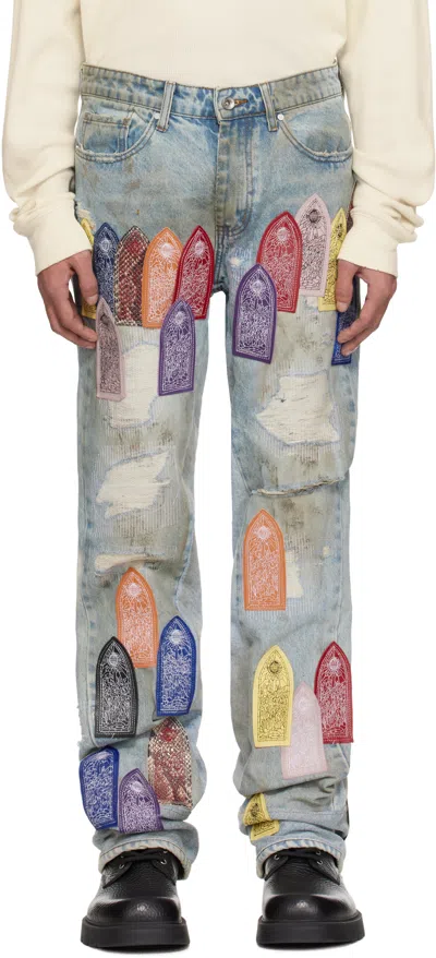 WHO DECIDES WAR BLUE PATCH ARCHED REPAIRED DISTRESSED JEANS