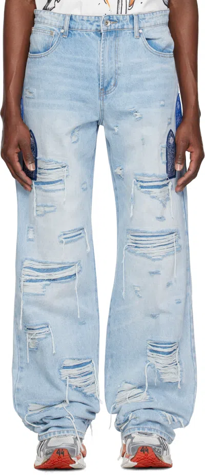 Who Decides War Blue Side Patch Relaxation Jeans