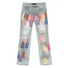 Who Decides War Patch Arched Distressed Jeans In Blue