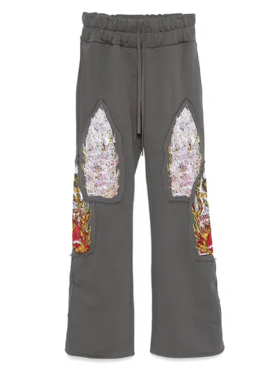 WHO DECIDES WAR TRIPLE FLAME GLASS TROUSERS