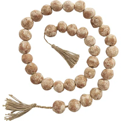 Willow Row Ceramic & Tassel Garland In Brown
