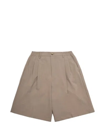Woc Lusaka Pleated Shorts In Brown