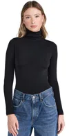 Wolford Seamless Fitted Turtleneck Long-sleeved Top In Black
