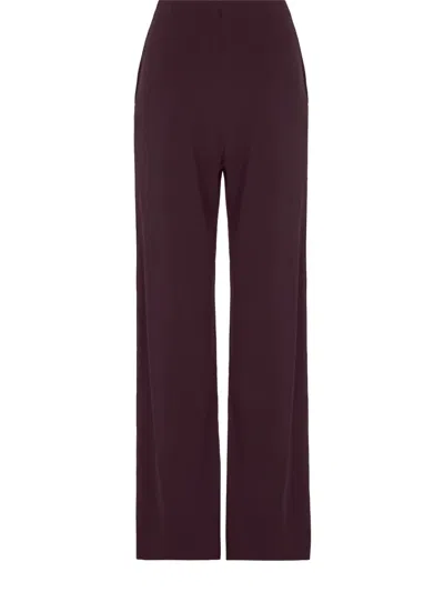 Wolford Crepe Couture Trousers In Burgundy
