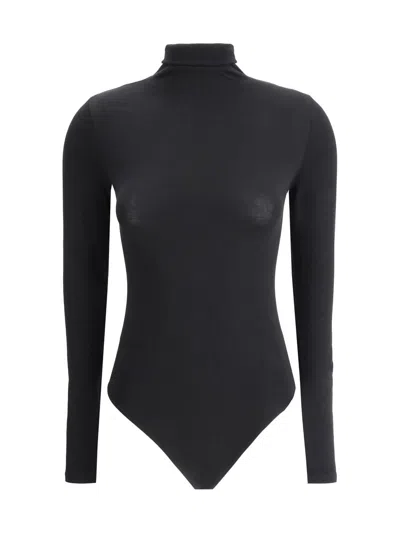 Wolford Seamless Fitted Turtleneck Long-sleeved Top In Black