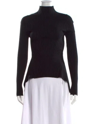 Pre-owned Wolford Virgin Wool Turtleneck Sweater In Black