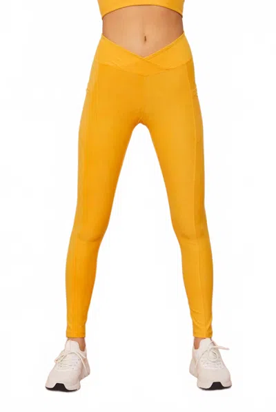 Wolven Ruched Active Crossover Pocket Legging In Mango In Yellow