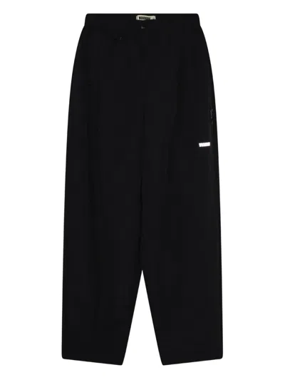 Woodbird Logo-embroidered Trousers In Black