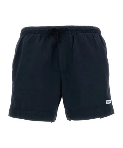 Woolrich Logo Patch Solid Swim Shorts In Blue