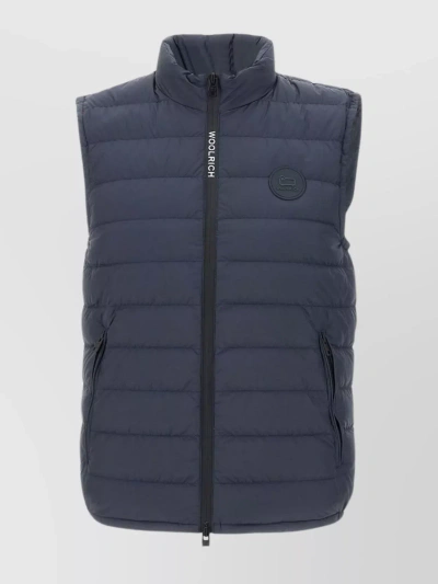 Woolrich Quilted Vest With High Collar And Zip Pockets In Blue