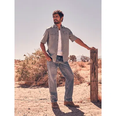 Wrangler ® Five Star Premium Denim Comfort Stretch Relaxed Fit Jean In Bleached Tint In Blue