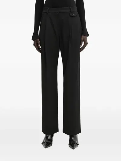 Wrstbhvr Dorea Logo-plaque Pleated Trousers In Black