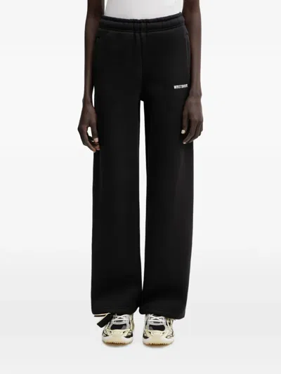 Wrstbhvr Naima Logo-print Track Pants In Black