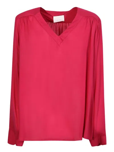 Xacus Tops