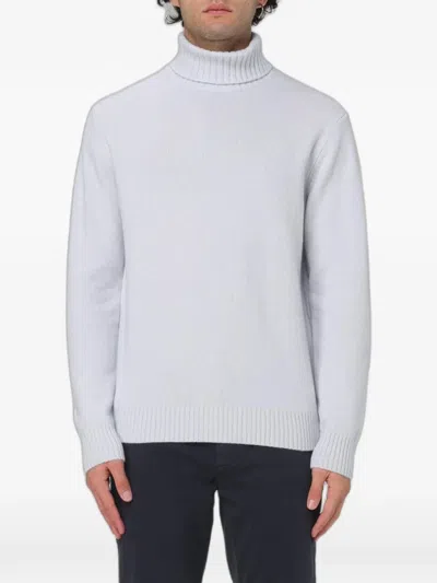 Xc Roll-neck Knitted Sweater In Blue