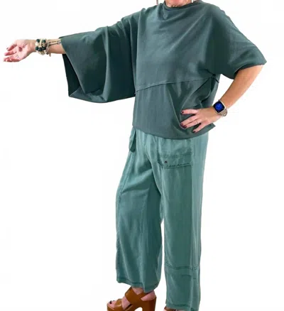 Xcvi Asymmetrical Ribbed Knit Statement Top In Emerald In Green